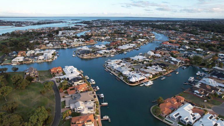 Aerial view of waterfront canal estate homes