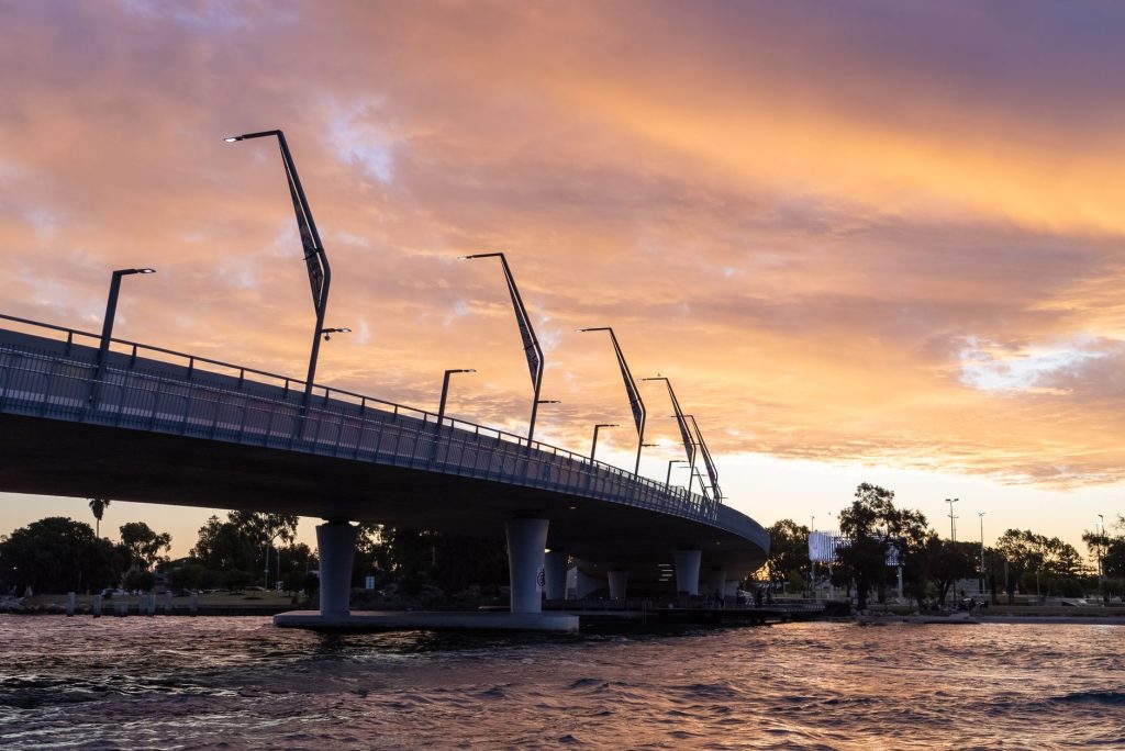 Scenic view of the Mandurah traffic bridge during a colorful twilight
